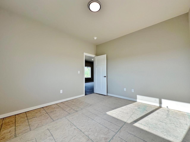1609 Heights Ave, Burlington, ND 58722 - spare room with baseboards