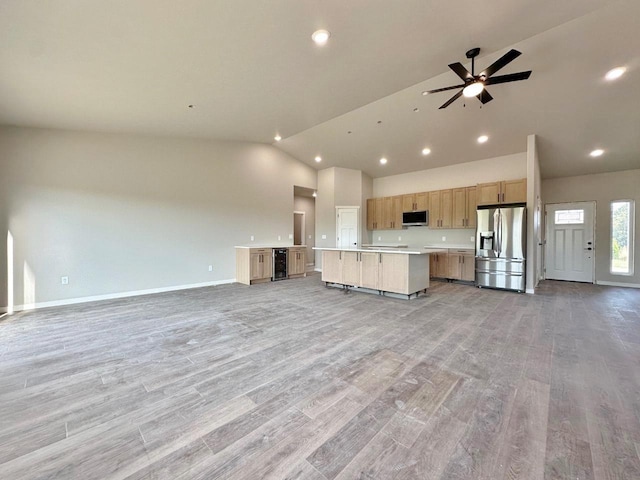 1609 Heights Ave, Burlington, ND 58722 - kitchen featuring appliances with stainless steel finishes, open floor plan, light countertops, a kitchen island, and recessed lighting