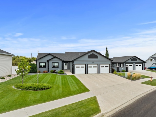 2009 35th Ave, Minot, ND 58701 - single story home with driveway, an attached garage, a front lawn, and stucco siding