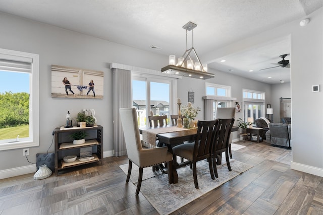 2009 35th Ave, Minot, ND 58701 - dining room with ceiling fan and recessed lighting