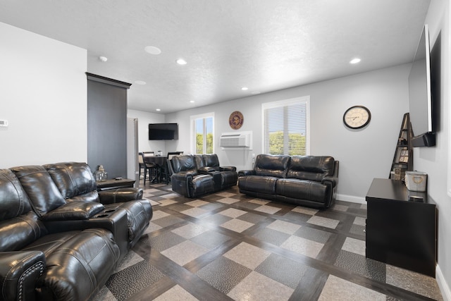 2009 35th Ave, Minot, ND 58701 - living room featuring recessed lighting and an AC wall unit