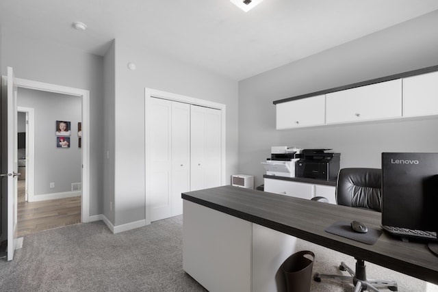2009 35th Ave, Minot, ND 58701 - home office featuring light colored carpet and baseboards
