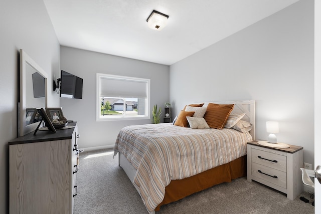 2009 35th Ave, Minot, ND 58701 - carpeted bedroom featuring baseboards