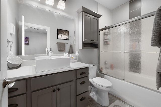 2009 35th Ave, Minot, ND 58701 - bathroom featuring vanity and enclosed tub / shower combo