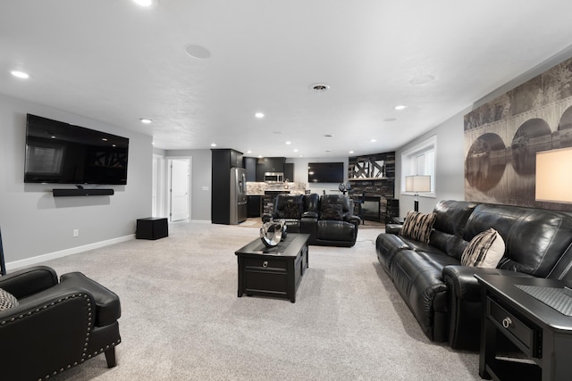 2009 35th Ave, Minot, ND 58701 - living area with light carpet and recessed lighting