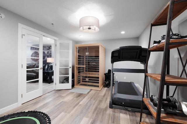 2009 35th Ave, Minot, ND 58701 - workout area with french doors, wood finished floors, and recessed lighting