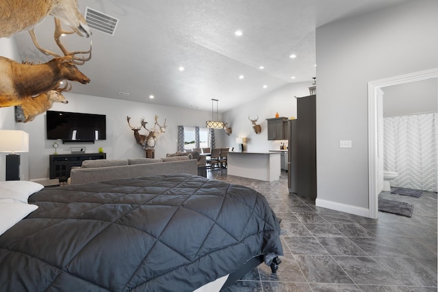 2009 35th Ave, Minot, ND 58701 - bedroom featuring vaulted ceiling and recessed lighting