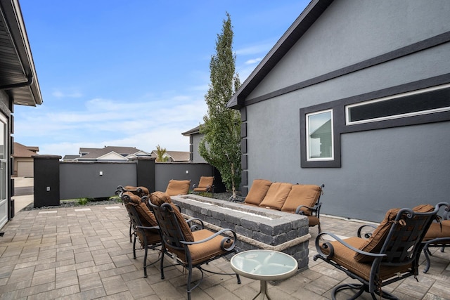 2009 35th Ave, Minot, ND 58701 - view of patio with an outdoor fire pit