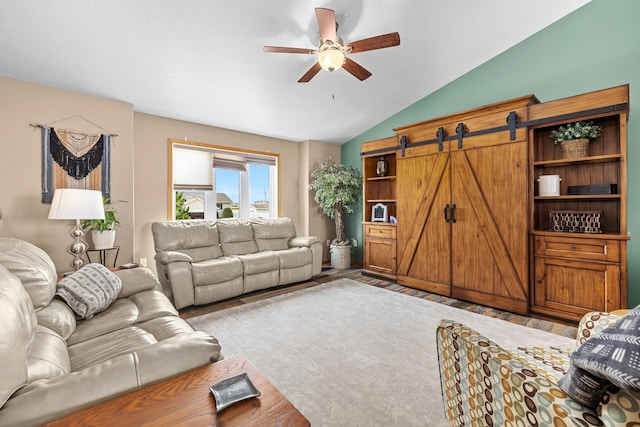 1808 28th St, Minot, ND 58703 - living area featuring ceiling fan, vaulted ceiling, and light wood-style floors
