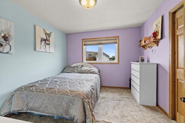 1808 28th St, Minot, ND 58703 - bedroom with light carpet and baseboards