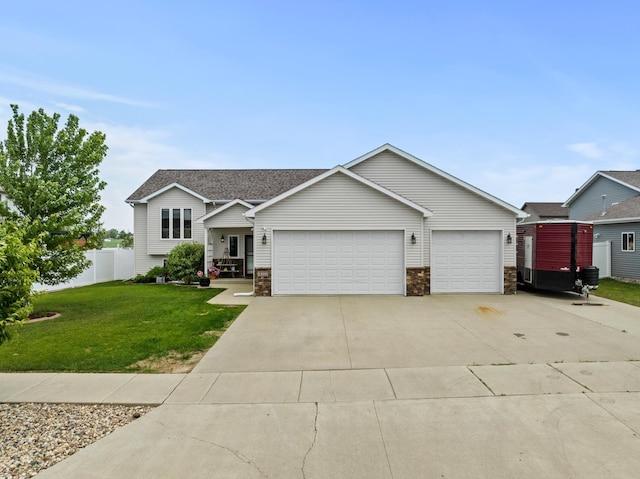 1808 28th St, Minot, ND 58703 - view of front of home with an attached garage and driveway