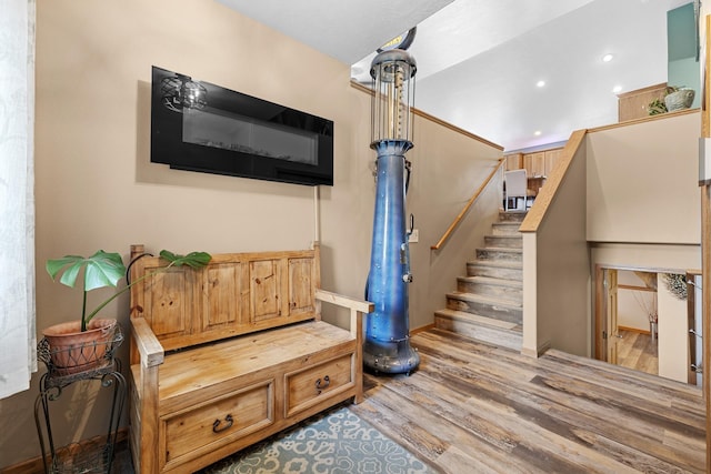 1808 28th St, Minot, ND 58703 - stairway featuring wood finished floors and recessed lighting