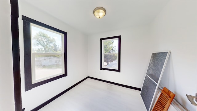 1113 10th St, Minot, ND 58703 - unfurnished room featuring baseboards