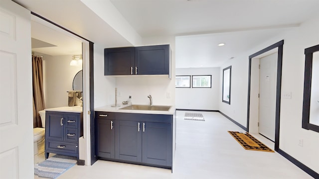 1113 10th St, Minot, ND 58703 - bar with a sink and recessed lighting