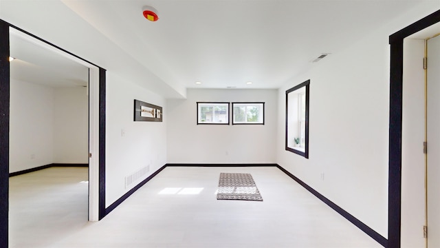 1113 10th St, Minot, ND 58703 - spare room with recessed lighting and light wood finished floors