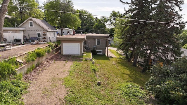 1113 10th St, Minot, ND 58703 - bungalow-style home featuring dirt driveway