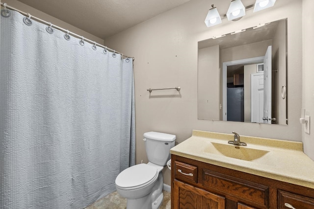 606 19th Ave Unit 7, Minot, ND 58701 - bathroom with toilet and vanity