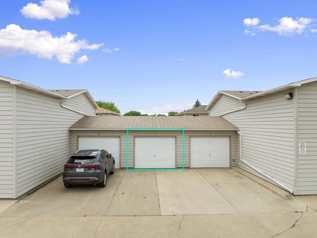 606 19th Ave Unit 7, Minot, ND 58701 - view of garage