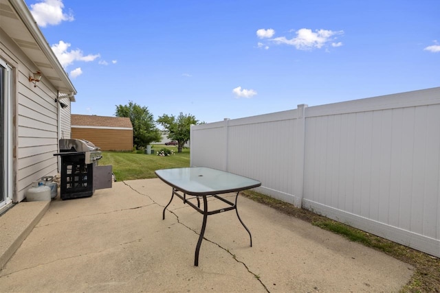 606 19th Ave Unit 7, Minot, ND 58701 - view of patio / terrace featuring grilling area