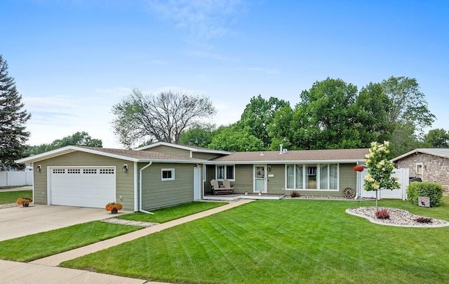 120 25th St, Minot, ND 58701 - ranch-style house featuring an attached garage and driveway
