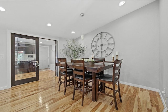 120 25th St, Minot, ND 58701 - dining area featuring light wood finished floors and recessed lighting