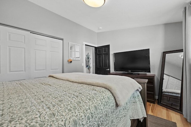 120 25th St, Minot, ND 58701 - bedroom with light wood-style floors