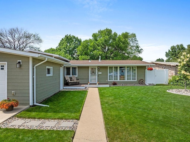 120 25th St, Minot, ND 58701 - ranch-style house featuring a garage