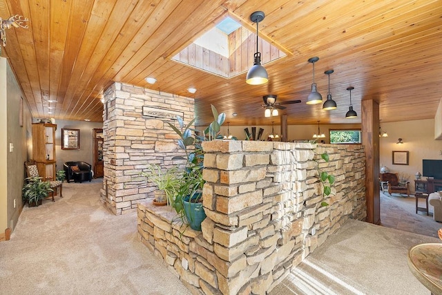 309 4th Ave, Mohall, ND 58761 - hall with carpet floors, wood ceiling, and a skylight