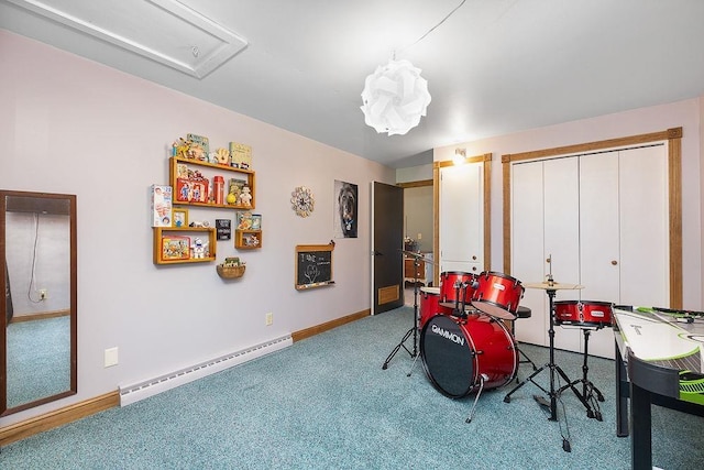 309 4th Ave, Mohall, ND 58761 - playroom with a baseboard radiator, carpet flooring, and attic access