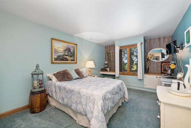 309 4th Ave, Mohall, ND 58761 - carpeted bedroom featuring baseboard heating and baseboards