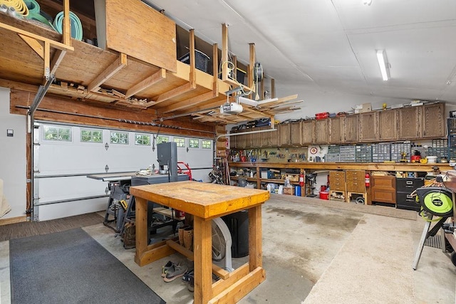 309 4th Ave, Mohall, ND 58761 - garage with a workshop area and a garage door opener