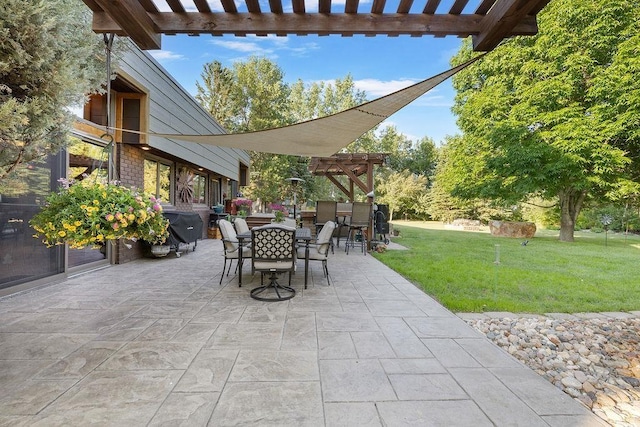 309 4th Ave, Mohall, ND 58761 - view of patio with outdoor dining space, a pergola, and a grill