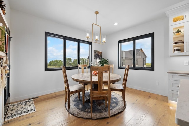 2415 43rd Ave, Minot, ND 58701 - dining room featuring recessed lighting and light wood-style floors