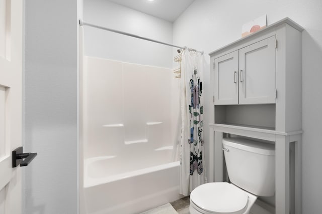 2415 43rd Ave, Minot, ND 58701 - bathroom featuring shower / bath combo with shower curtain and toilet