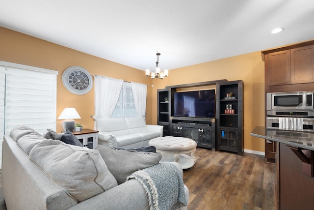 4007 Crossing St, Minot, ND 58701 - living room with a chandelier, dark wood finished floors, and recessed lighting