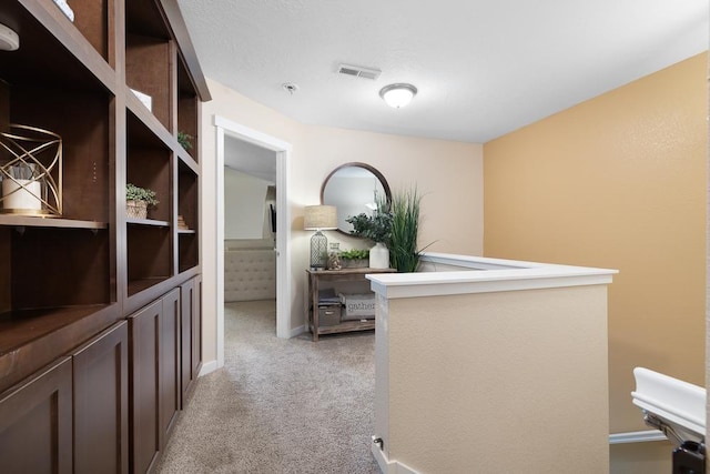 4007 Crossing St, Minot, ND 58701 - corridor featuring light colored carpet and baseboards