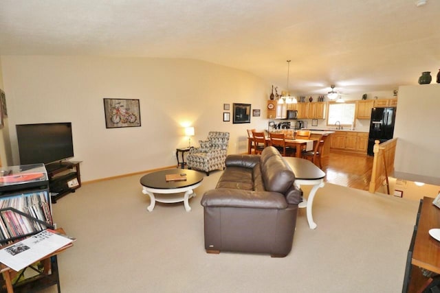2033 14th St, Minot, ND 58703 - living area with lofted ceiling and light colored carpet