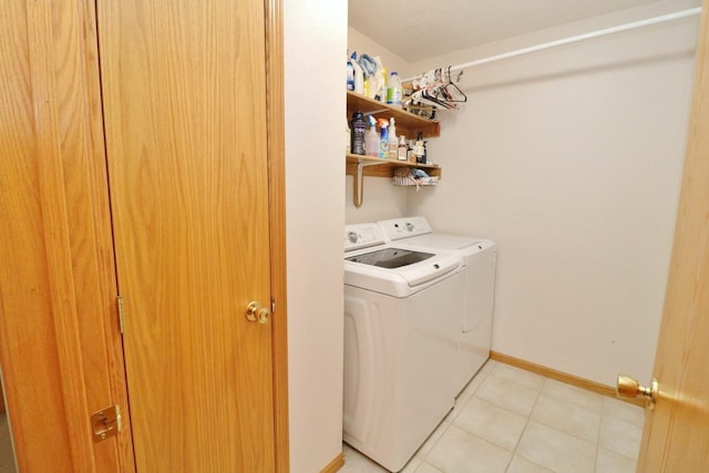 2033 14th St, Minot, ND 58703 - laundry room featuring independent washer and dryer and light tile patterned flooring
