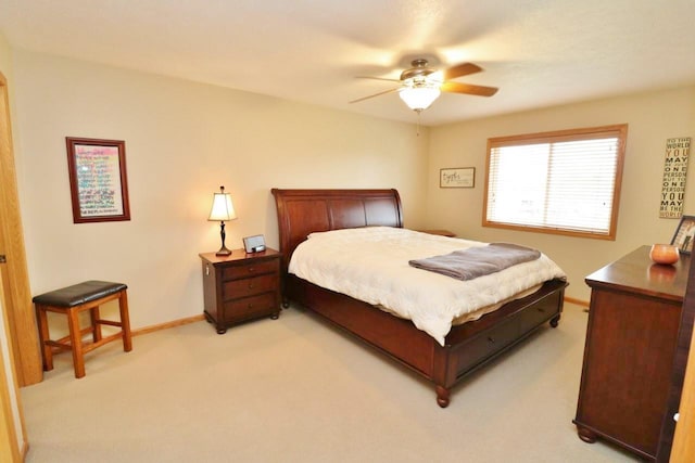 2033 14th St, Minot, ND 58703 - bedroom with carpet floors and a ceiling fan