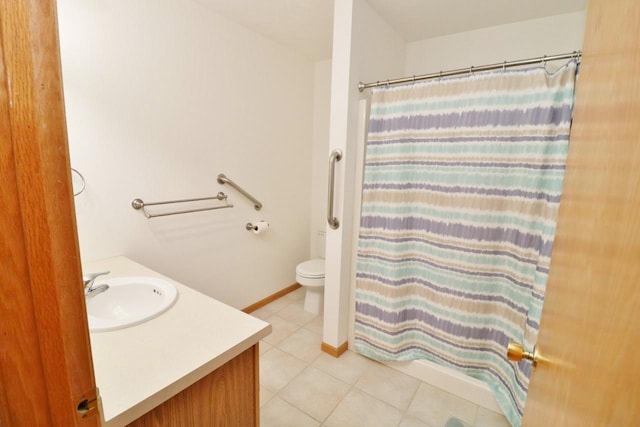 2033 14th St, Minot, ND 58703 - full bath with tile patterned floors, vanity, and curtained shower