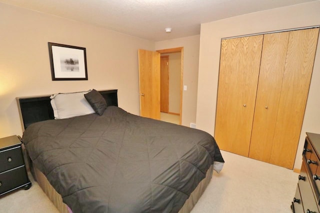 2033 14th St, Minot, ND 58703 - carpeted bedroom with a closet