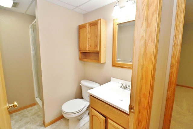 2033 14th St, Minot, ND 58703 - bathroom with vanity, a shower with shower curtain, and a drop ceiling