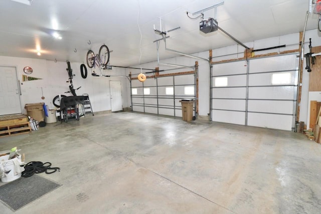 2033 14th St, Minot, ND 58703 - garage with a garage door opener