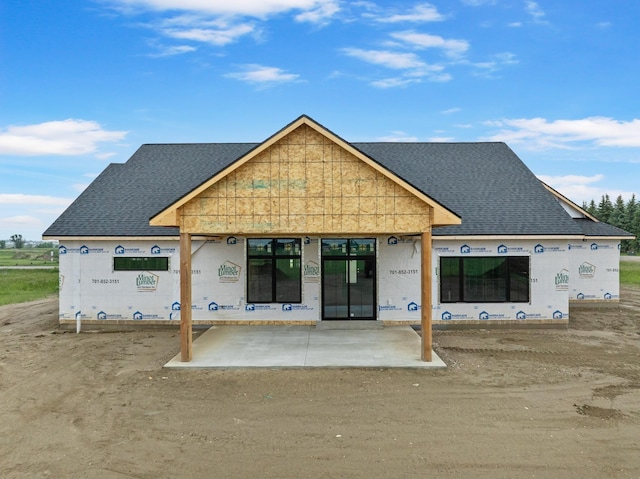 2610 43rd Ave, Minot, ND 58701 - rear view of house with roof with shingles