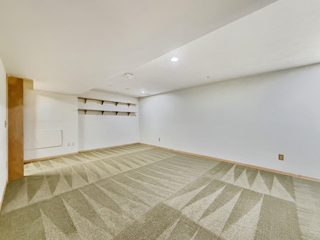 1434 10th St, Minot, ND 58701 - carpeted empty room featuring baseboards and recessed lighting
