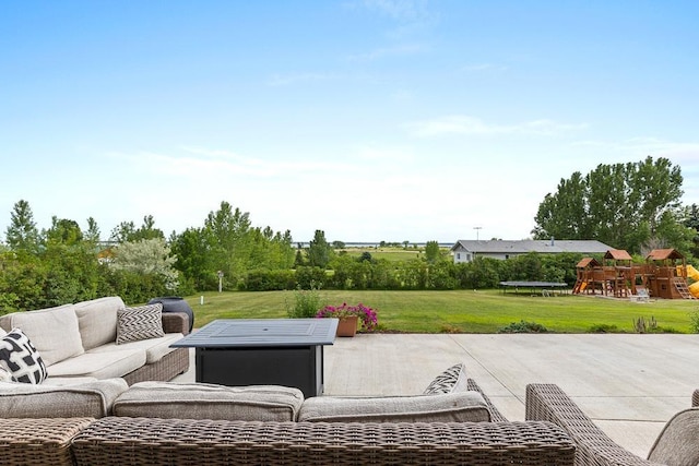 4610 12d St NW, Garrison, ND 58540 - view of patio with outdoor lounge area, a playground, and a trampoline