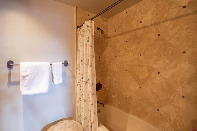 bathroom featuring shower / bath combination with curtain