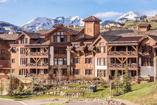 view of building exterior featuring a mountain view