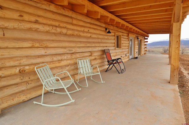 view of patio with a mountain view