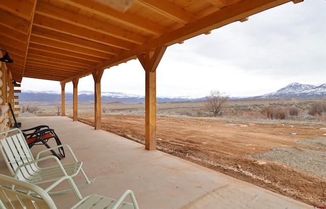 view of patio featuring a mountain view